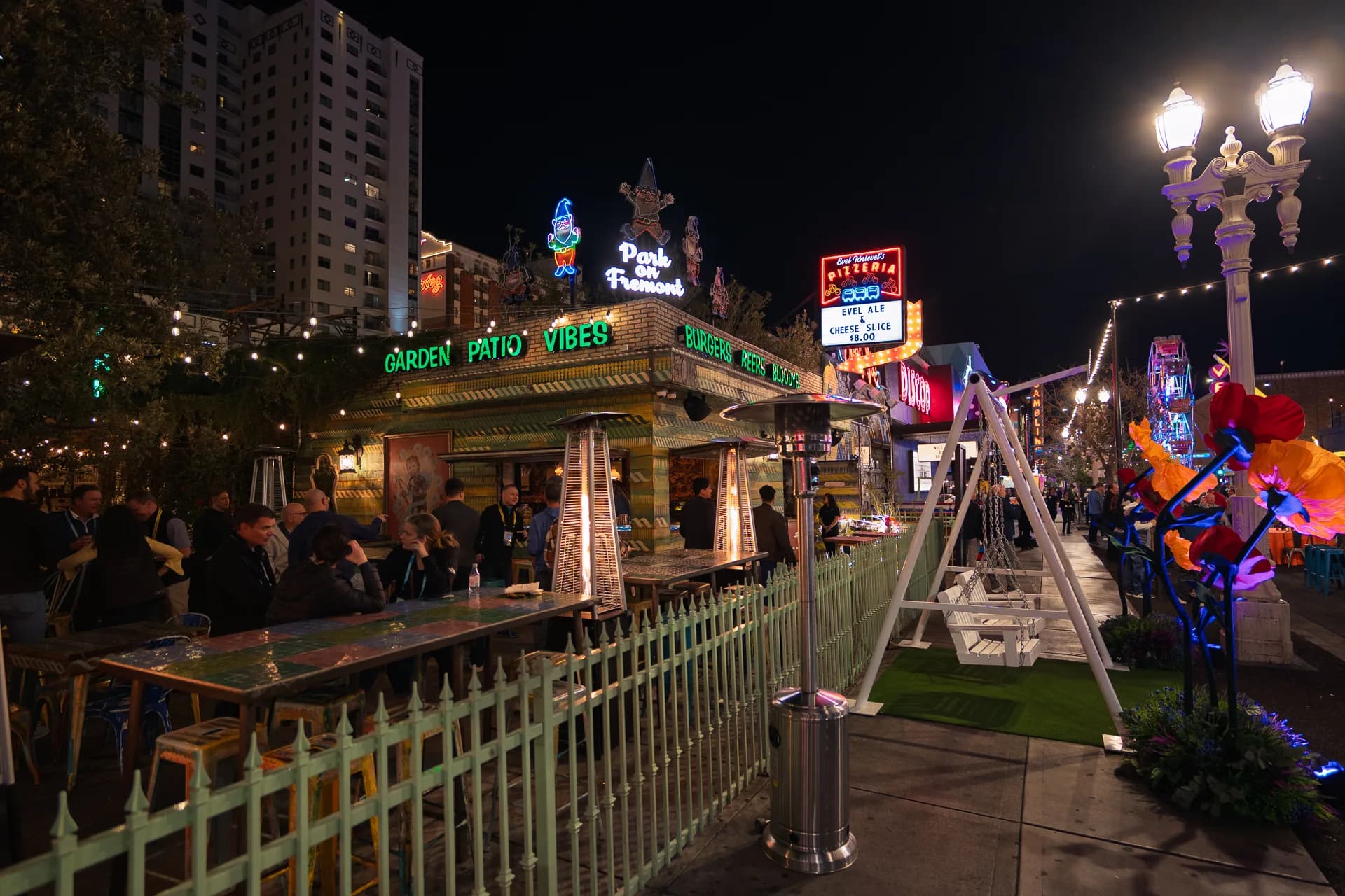 The Park on Fremont patio at night with string lights and lounge seating