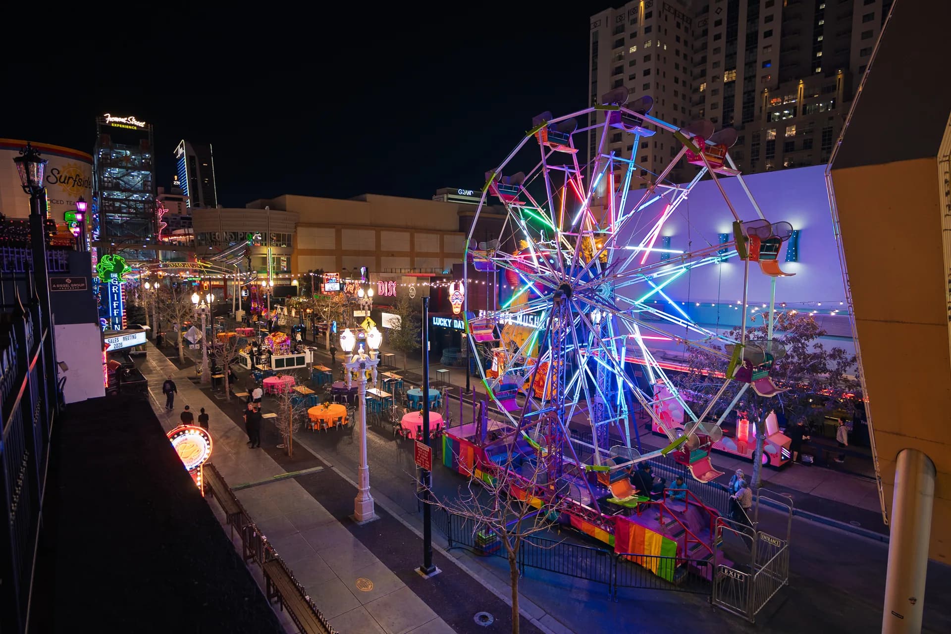 East Fremont Street at night with the Ferris wheel and activation zones